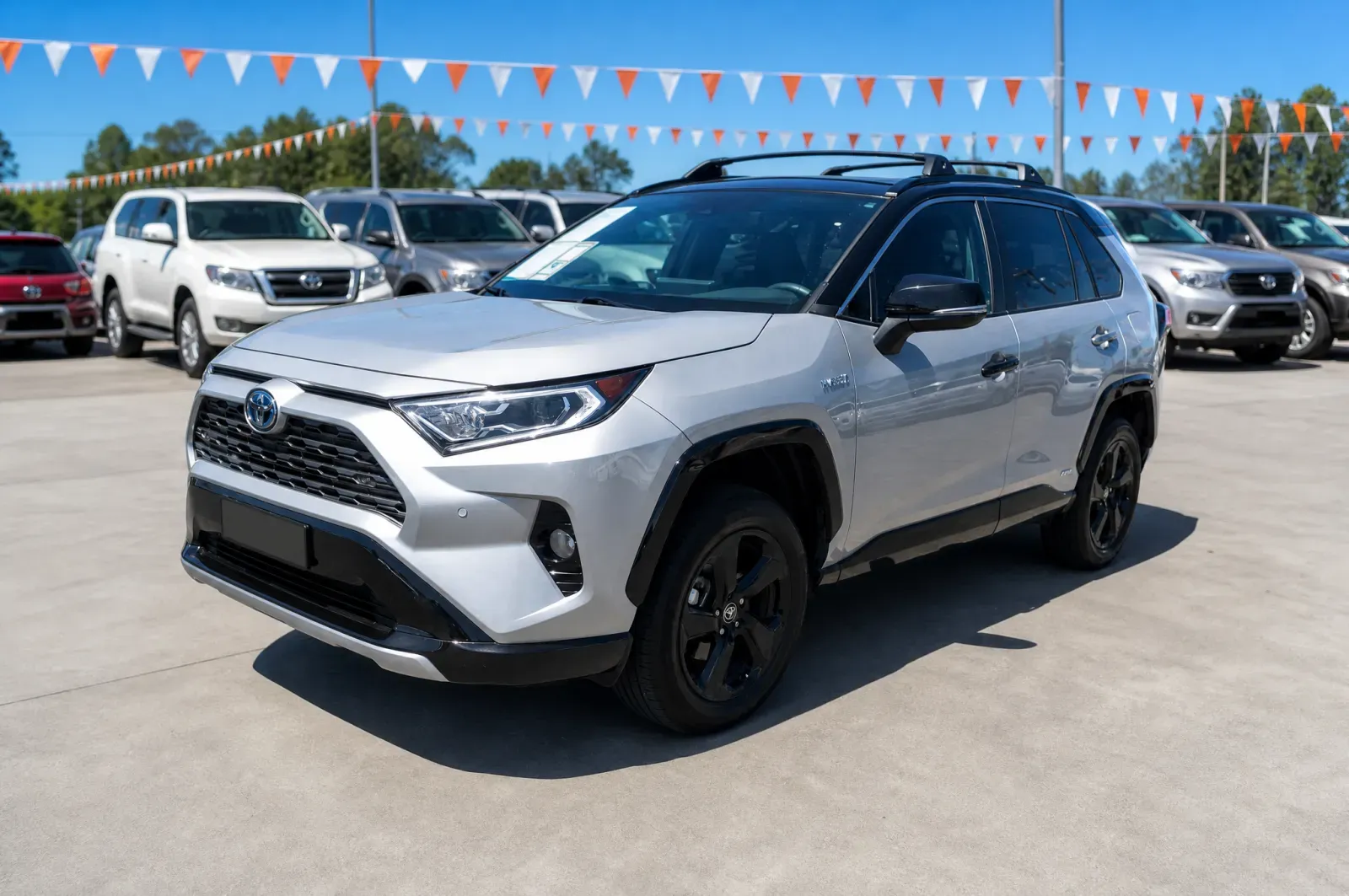 Used Toyota RAV4 Hybrid parked on a car yard